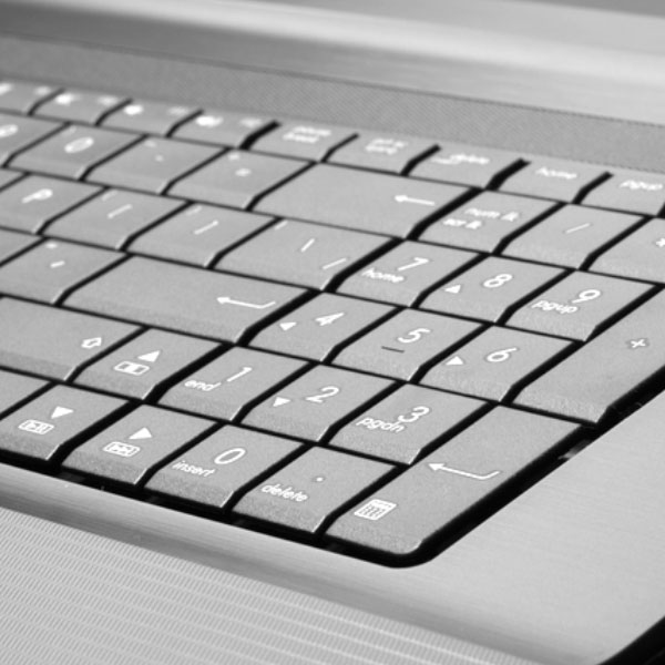 A keyboard symbolizing financial planning account access.