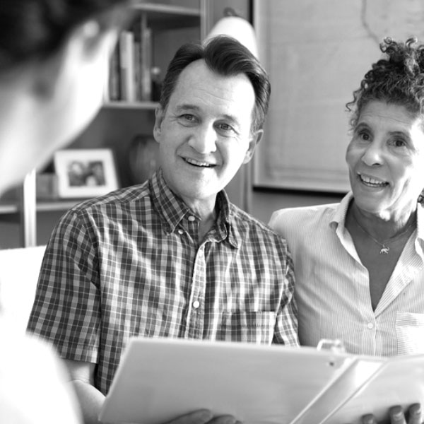 Financial planning advisors discussing investments.