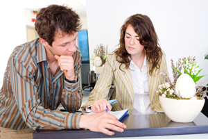 small business partners paying off small business debt
